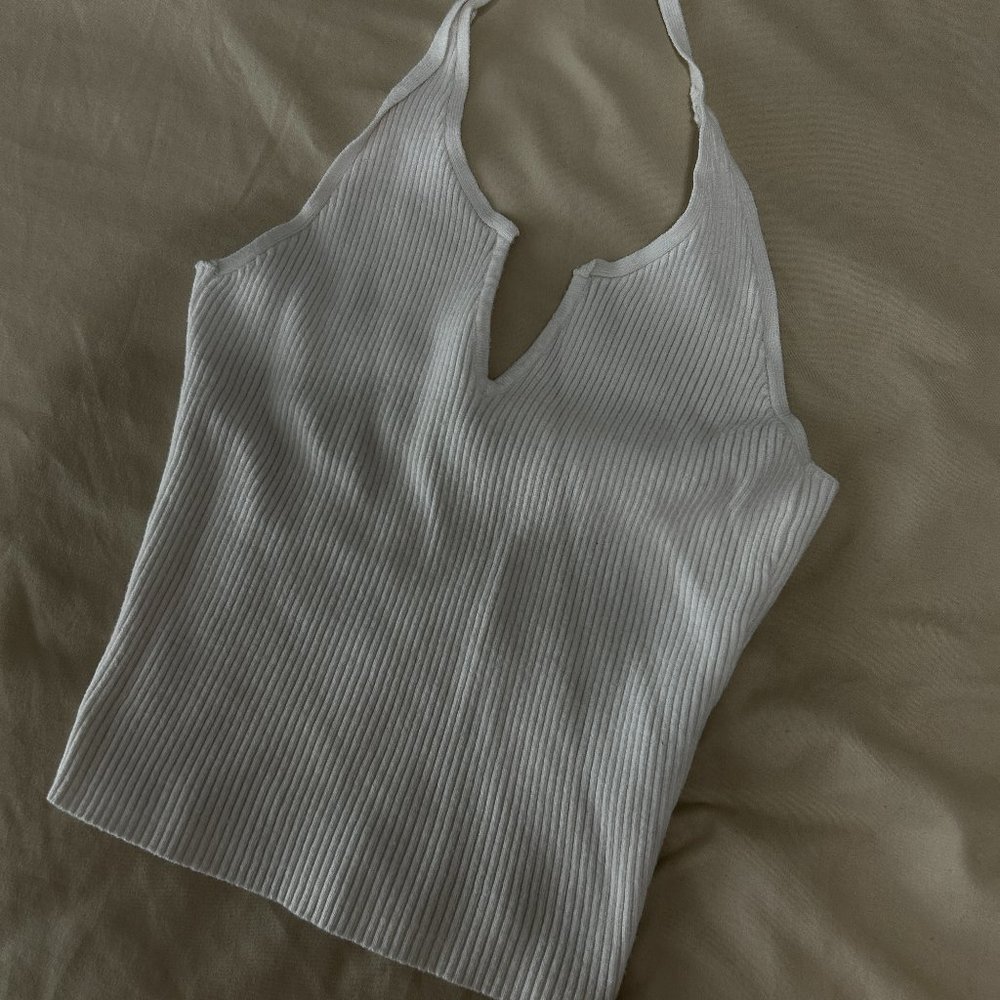 The perfect white halter. Super stretchy. Soft material. Great for layering.